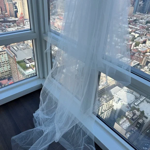 Brand new, pure white, whimsical veil
